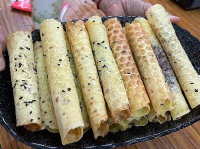 點亮馬卡道健康農產USR團隊赴老埤村與長者同樂製作「馬卡道紅藜蛋捲」1